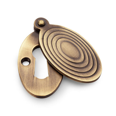 Alexander & Wilks Standard Profile Ellipse Escutcheon with Christoph Design Cover, Antique Brass - AW385-AB ANTIQUE BRASS